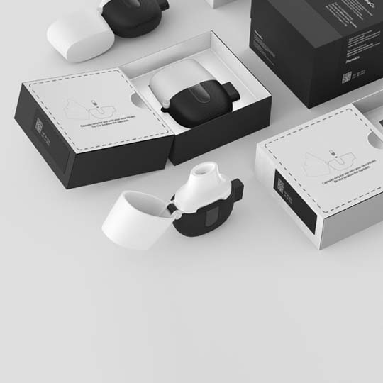 Black and white medical device packaging with product shots. The device features a white top and black base. Instruction manual included.